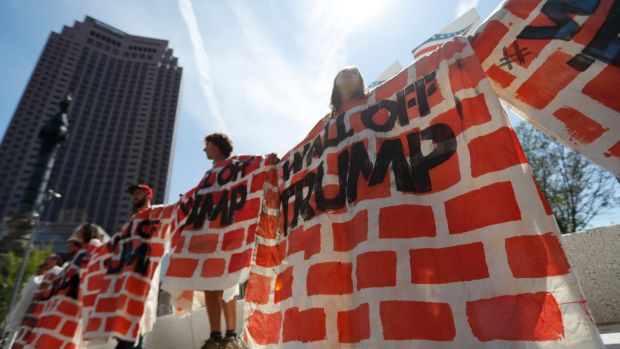 Activists protested at the Republican convention in Cleveland over Donald Trump's plans for a wall along the US-Mexican ...