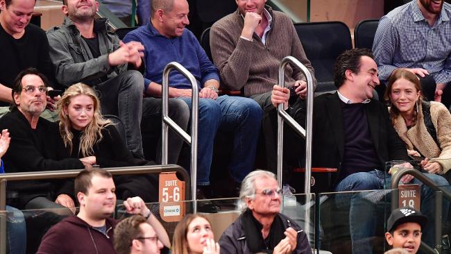 Ashley Olsen, Richard Sachs, Olivier Sarkozy and Mary-Kate Olsen attend the New York Knicks vs. Brooklyn Nets game.