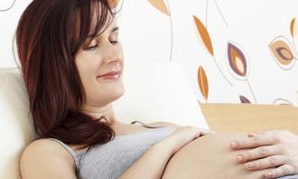 Pregnant woman smiling