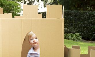 Boy in box fort