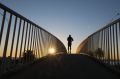 Saying goodbye to the weekend at the footbridge that crosses Jacka Boulevard in St Kilda.