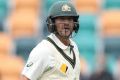 Joe Burns leaves Bellerive Oval following his dismissal on day three.