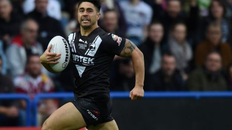 Try time: Shaun Johnson races away to score during the Kiwi's victory over England.