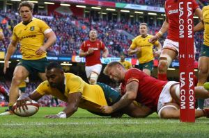 Proving his worth: Tevita Kuridrani powers over to score.