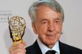 Norman Brokaw poses with the Governor's Award at the Creative Arts Emmy Awards in Los Angeles in 2010.