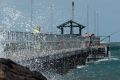 Despite the tragedy - and the wild weather - there were still fisherman on Mordialloc pier on Monday morning. 