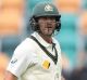 Joe Burns leaves Bellerive Oval following his dismissal on day three.