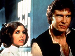 (L-r) actor Mark Hamill with Carrie Fisher and Harrison Ford in scene from Special Edition "Star Wars" film trilogy. /Films/Titles/Star/Wars