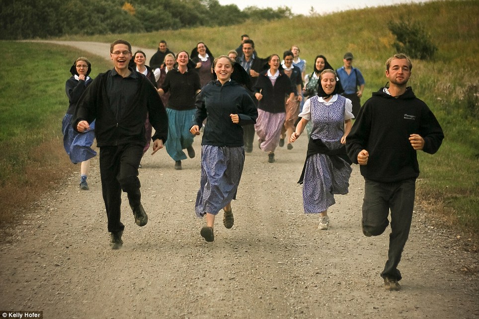 A simple life: Kelly Hofer spent nearly all his life documenting life inside the Hutterite commune where he grew up - a place where photography is considered a sin