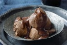 Creamy chocolate ice-cream with dark chocolate sauce