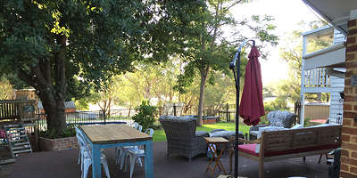 Relax on our family friendly back deck with swan river views