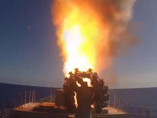 An image grab taken from a video footage made available on the Russian Defence Ministry's official website on November 15, 2016, reportedly shows the frigate Admiral Grigorovich launching cruise missiles in the eastern Mediterranean off the Syrian coast during a strike against Islamic State (IS) group's positions in Syria. Russian Defence Minister Sergei Shoigu said on November 15 that jets from the Admiral Kuznetsov aircraft carrier deployed in the eastern Mediterranean had launched their first strikes on Syria. / AFP PHOTO / Russian Defence Ministry / HO / RESTRICTED TO EDITORIAL USE - MANDATORY CREDIT "AFP PHOTO / HO / Russian Defence Ministry - NO MARKETING NO ADVERTISING CAMPAIGNS - DISTRIBUTED AS A SERVICE TO CLIENTS