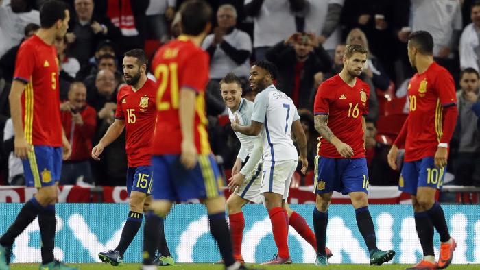 Spain players react after England's Jamie Vardy, center left, scored England's second goal during the international friendly soccer match between England and Spain at Wembley stadium in London, Tuesday, Nov. 15, 2016. (AP Photo/Frank Augstein)