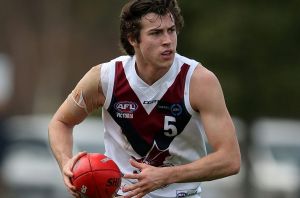 MELBOURNE, AUSTRALIA - AUGUST 13: Andrew Mcgrath of Sandringham runs with the ball during the round 16 TAC Cup match ...