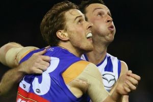 North Melbourne and Western Bulldogs are to play in the first Good Friday match. 