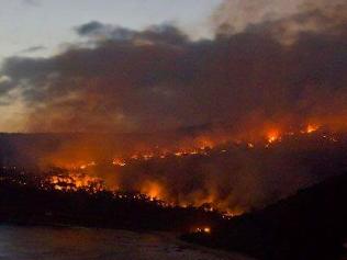 Bushfires burn at Wye River Picture Tony Maly