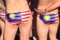 Australians arrested in Malaysia for stripping down at the Grand Prix. 