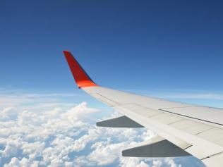 Aircraft wing on the sky