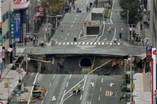 Road reopens a week after sinkhole appears (ABC News)