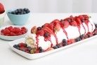 How to make a Soft pavlova roll with liqueur mascarpone and berry compote