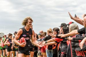 Banned Essendon players resume training with the official team after serving the ban. Dyson Heppell is welcomed back by ...