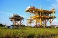 An abandoned production platform waiting to be sold at the Port of Iberia, Louisiana, USA.