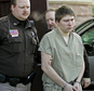 FILE - In this March 3, 2006 file photo, Brendan Dassey, is escorted out of a Manitowoc County Circuit courtroom in Manitowoc, Wis. Dassey, whose homicide conviction was overturned in a case profiled in the Netflix series "Making a Murderer" was ordered released Monday, Nov. 14, 2016, from federal prison while prosecutors appeal. Dassey's supervised release was not immediate and is contingent upon him meeting multiple conditions. (AP Photo/Morry Gash, File)