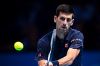 LONDON, ENGLAND - NOVEMBER 15:  Novak Djokovic of Serbia in action during his men's singles match against Milos Raonic ...