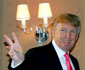  Donald Trump, chairman and president of the Trump Organization, gestures to reporters after a press conference at a hotel in Tokyo, Monday, Oct. 30, 2006. Trump announced plans to build the Trump International Hotel and Tower, the first luxury hotel cond