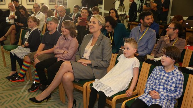 Deputy Opposition Leader Tanya Plibersek and families listen to leader Bill Shorten.