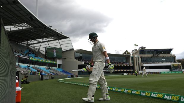 Skipper Steve Smith walks off after being dismissed on day four.