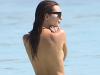 Emily Ratajkowski goes topless in Cancun