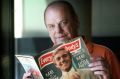 James Cockington with a vintage magazine he has collected.