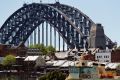 SHD. News. The Sydney Swans flag flies over the Harbour Bridge on the day of the AFL Grand Final, Sydney Swans vs ...