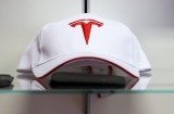 With Donald Trump heading the US, the Tesla cap may still fit.