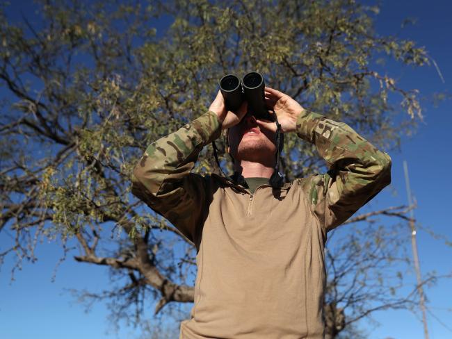 A crackdown on border security was one of the main planks of Trump’s campaign. Pictured, a member of a civilian force guards the US border. Picture: John Moore/Getty Images/AFP.