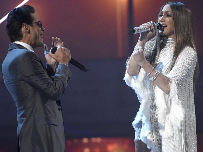 Marc Anthony, left, and Jennifer Lopez perform &quot;Olvidame y Pega la Vuelta&quot; at the 17th annual Latin Grammy Awards at the T-Mobile Arena on Thursday, Nov. 17, 2016, in Las Vegas. (Photo by Chris Pizzello/Invision/AP)