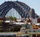 SHD. News. The Sydney Swans flag flies over the Harbour Bridge on the day of the AFL Grand Final, Sydney Swans vs ...