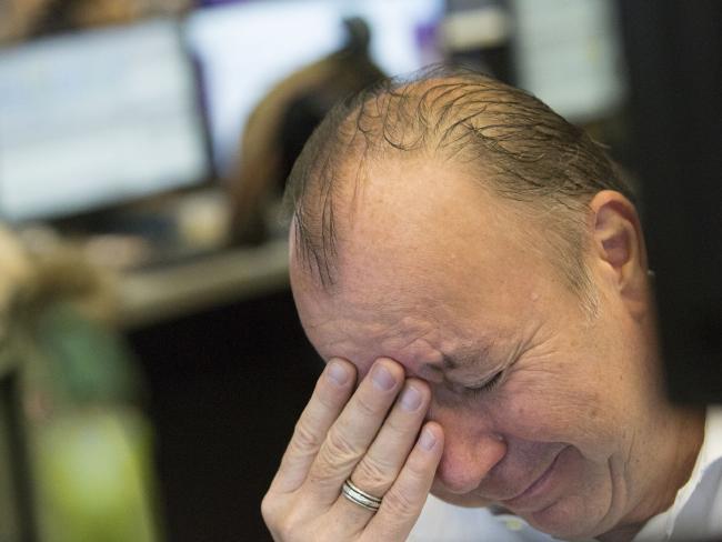 A trader reacts to the US Presidential election result at the Frankfurt Stock Exchange. Picture: Alex Kraus/Bloomberg