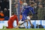 Chelsea's Diego Costa runs to celebrate after he scored his sides first goal as PSG's Thiago Silva, right, and PSG goalkeeper Kevin Trapp, left, are seen during the round of sixteen second leg Champions League soccer match between Chelsea and Paris Saint-Germain at Stamford