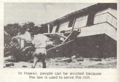 Black and white photograph of a house being bulldozed.