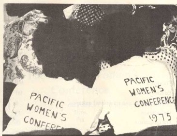 Black and white photograph of women wearing the Pacific Women's Conference t-shirts.