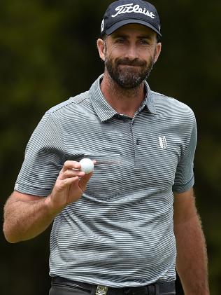 AustraliaÕs Geoff Ogilvy gestures to spectators after sinking a birdie putt on the 16th hole during round 3 of the Australian Open Golf Championship at the Royal Sydney Golf Club in Sydney on Saturday, Nov. 19, 2016. (AAP Image/Dan Himbrechts) NO ARCHIVING, EDITORIAL USE ONLY