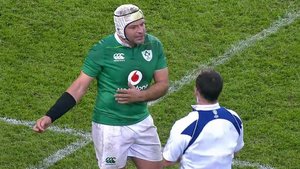 Rory Best discussing the third try with the referee