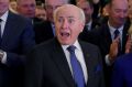 Former prime minister John Howard, pictured with wife Janet, at the Coalition's official campaign launch.