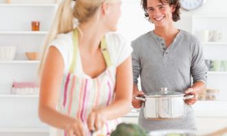 Healthy couple cooking togethe...