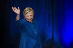 Hillary Clinton waves after addressing the Children's Defense Fund's Beat the Odds celebration at the Newseum in Washington, Wednesday, Nov. 16, 2016.