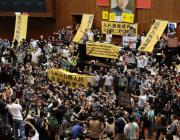 Students opposed to a trade deal with China occupy the Taiwanese parliament