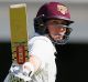 BRISBANE, AUSTRALIA - NOVEMBER 17: Queensland's Matthew Renshaw celebrates bringing up his century during day one of the ...