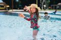 Mila Kelly, 4, of Crace, enjoying the warm weather at Manuka Pool.